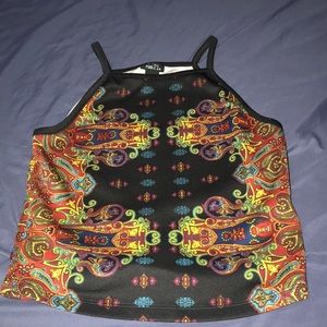 black croptop with colorful designs.